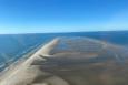 a sandbar in the middle of a waterway is shown 