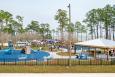 Bayfront Park's nautical-themed playground (Photo: Mobile County) a kid's playground with people milling about