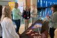 People look on as an education/outreach expert discusses oysters and water quality.