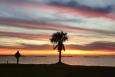 A beach at Cypremort Point State Park at sunset.