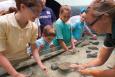 Children juvenile rays in an exhibit in the Shreveport Sci-Port Discovery Center.