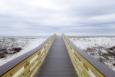 boardwalk in white sand