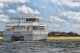 A ferry motoring away toward its destination.