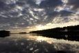 The sun is rising in Grand Bay National Estuarine Research Reserve.