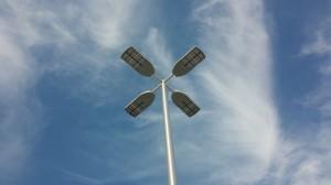 Looking up at a light-pole with four segments